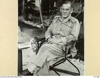 FINSCHHAFEN AREA, NEW GUINEA. 1944-03-20. VX221 BRIGADIER F.K. NORRIS, CBE, DSO, ED, (1), DEPUTY DIRECTOR OF MEDICAL SERVICES, AT HEADQUARTERS, 2ND AUSTRALIAN CORPS