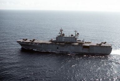 A port beam view of the amphibious assault ship USS SAIPAN (LHA-2) underway during exercise Ocean Venture '81