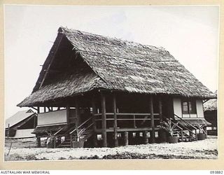 CAPE WOM, WEWAK AREA, NEW GUINEA, 1945-07-11. EXTERIOR VIEW OF THE RESIDENCE ERECTED FOR HIS ROYAL HIGHNESS, THE DUKE OF GLOUCESTER, GOVERNOR-GENERAL OF AUSTRALIA, BY ROYAL AUSTRALIAN ENGINEERS ..