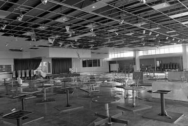 An interior view of the damage to the officer's club caused by Hurricane Iwa