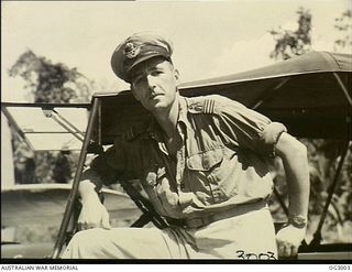 AITAPE, NORTH EAST NEW GUINEA. C. 1945-06. PORTRAIT OF FLIGHT LIEUTENANT R. E. WALTERS RAAF, MELBOURNE, VIC