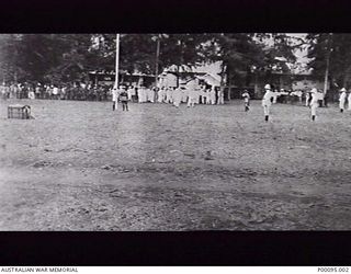 RABAUL, NEW BRITAIN. PROTECTORATE OF GERMAN NEW GUINEA, 1914-11-30. THE SCENE IN PROCLAMATION SQUARE JUST BEFORE OR JUST AFTER THE PUBLIC CANING OF THE PERPETRATORS OF THE ATTACK BY MASKED GERMANS ..