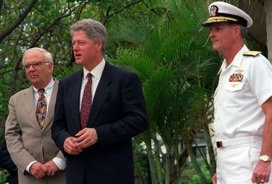 President William Jefferson Clinton arrives at Admiral's Landing along with Secretary of Defense Les Aspin, left, and Adm. Charles R. Larson, commander-in-chief, U.S. Pacific Fleet, right, as the three prepare to visit the ARIZONA (BB-39) Memorial. The men are in Hawaii to tour area military installations