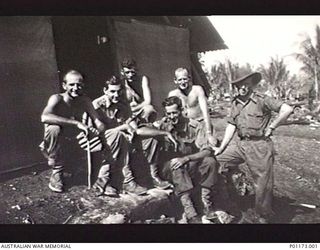JACQUINOT BAY, NEW BRITAIN. 1945. MEN OF THE INTELLIGENCE SECTION, 13 INFANTRY BRIGADE HEADQUARTERS. LEFT TO RIGHT: GRAHAM HORNCASTLE, BILL KENNEDY, CAPTAIN MCRUSSELL, GEORGE DAY (FROM NARROGIN), ..