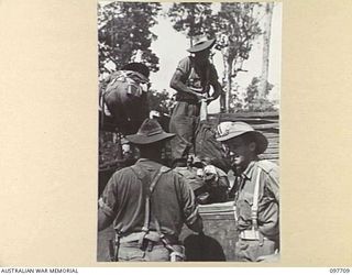 TOROKINA, BOUGAINVILLE. 1945-09-22. JAPANESE TROOPS FROM NAURU ISLAND, ON ARRIVAL AT TOROKINA PER SS RIVER BURDEKIN AND SS RIVER GLENELG, WERE MARCHED ALONG THE PIVA ROAD TO THE PRISON COMPOUND AT ..