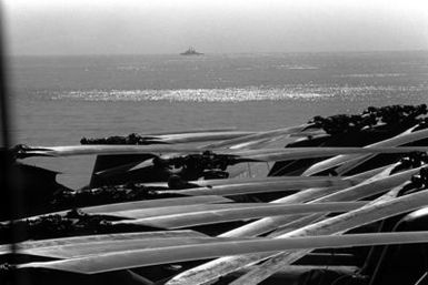 A view of several CH-46E Sea Knight helicopters parked on the flight deck of the amphibious assault ship USS GUAM (LPH-9) during operations off the coast of Beirut, Lebanon