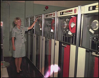 Camp Smith, Hawaii. PFC Patricia Barbeau operates a tape-drive on the IBM 729 at Camp Smith.