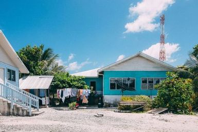 Satellite dish outside of house, Atafu, Tokelau