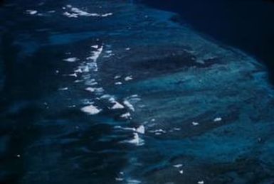 [Aerial view of a barrier reef in Papua New Guinea]