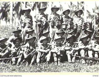 MADANG, NEW GUINEA. 1944-06-30. PERSONNEL OF NO. 12 PLATOON, B COMPANY, 24TH INFANTRY BATTALION. IDENTIFIED PERSONNEL ARE:- VX143552 PRIVATE J.W. DOOLEY (1); VX136016 PRIVATE J.W. HESTER (2); ..