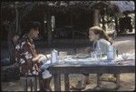 Ann Rappaport and Poia share a meal, Ma'atia, Moorea