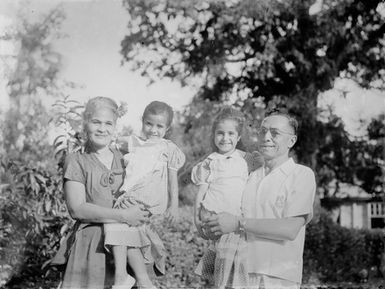 [Group portrait of a Pacific island Family]