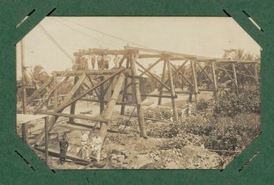 Workers posing on wharf under construction.  From the album: Banaba (Ocean Island)