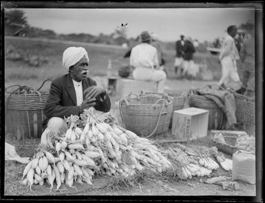 An unidentified vegetable seller at a market, Suva, Fiji