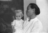 Guam, woman holding a young girl
