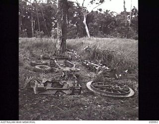 PORT MORESBY, NEW GUINEA. 1943-11-15. A "NORMAL" 25-POUNDER GUN OF THE 2/5TH AUSTRALIAN FIELD REGIMENT STRIPPED DOWN TO ITS COMPONENT PARTS AND READY FOR TRANSPORT BY AIRCRAFT TO ANY AREA