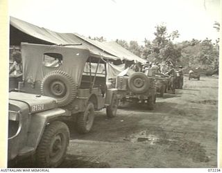 KILIGIA, NEW GUINEA. 1944-04-10. LOADED JEEPS OUTSIDE THE CANTEEN ISSUING POINT 27E OPERATED BY THE AUSTRALIAN ARMY CANTEENS SERVICE