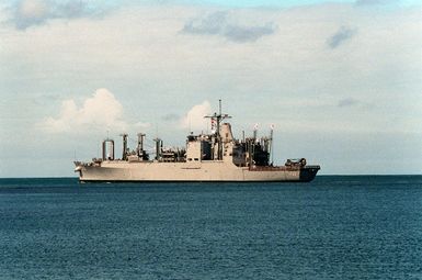 The ammunition ship USS SHASTA (AE-33) heads out to sea following a port visit to Naval Station, Pearl Harbor, Hawaii. The SHASTA is en route to its home port after serving in the Persian Gulf region during Operation Desert Shield and Operation Desert Storm.