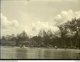 BOUGAINVILLE ISLAND, SOLOMON ISLANDS. C. 1945-01-25. THE VERSATILE ANSON AIRCRAFT OF NO. 10 COMMUNICATIONS UNIT RAAF BASED AT TOROKINA SKIRTS UP THE COAST AS THE CREW WATCH FOR THE CONCEALED ..