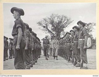 TOROKINA, BOUGAINVILLE. 1945-07-03. HIS ROYAL HIGHNESS, THE DUKE OF GLOUCESTER, GOVERNOR-GENERAL OF AUSTRALIA (2), ACCOMPANIED BY MAJOR A.N. LAWSON, ALLIED GUARD COMMANDER, 61 INFANTRY BATTALION ..