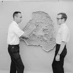 William A. Newman and Joseph Curray with a model of Truk Island. Caramarsel Expedition. June 9, 1969
