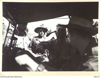 WEWAK AIRSTRIP, NEW GUINEA, 1945-09-20. LIEUTENANT-GENERAL K. YOSHIWARA CLIMBING INTO A JEEP AFTER ARRIVAL BY PLANE FROM HAYFIELD WITH STAFF OFFICERS AND A PARTY FROM 18 JAPANESE ARMY AT HQ 6 ..