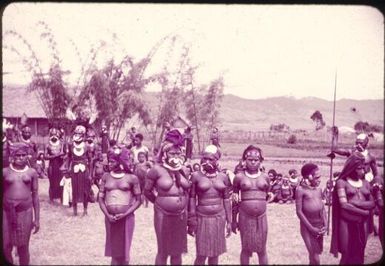 Unmarried native women visiting station on occasion of Assistant District Officer's visit (a daily sight) : Wahgi Valley, Papua New Guinea, 1954-1955 / Terence and Margaret Spencer