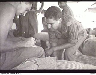 BORAM BEACH, NEW GUINEA, 1945-10-14. ELEVEN INDIAN SOLDIERS WERE LIBERATED FROM THE JAPANESE AT MARIENBERG IN THE SEPIK RIVER AREA, AND TAKEN TO 2/15TH FIELD AMBULANCE FOR MEDICAL TREATMENT. SHOWN, ..