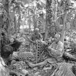 Group of men weaving