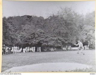 PORT MORESBY - FLYING OFFICER K.M. HAMPSHIRE WINNING HOP, STEP AND JUMP AT A.A.C. SPORTS. (NEGATIVE BY N. TRACY)