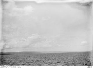 ST. GEORGE'S CHANNEL AND BLANCHE BAY. RABAUL LIES NEAR THE RIGHT CENTRE OF THE PICTURE. (THIS PHOTOGRAPH FORMS PART OF A PANORAMA WITH J3082