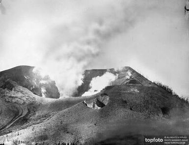 Smoke and volcanic mud pouring