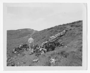 [Servicemen Inspecting Remains of Japanese Bomber]