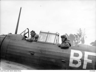 TOROKINA, BOUGAINVILLE ISLAND, SOLOMON ISLANDS. 1945-08-17. A WIRRAWAY AIRCRAFT OF NO. 5 (TACTICAL RECONNAISSANCE) SQUADRON RAAF RETURNS TO BASE AFTER DROPPING LIEUTENANT S. G. SAVIGE'S SURRENDER ..