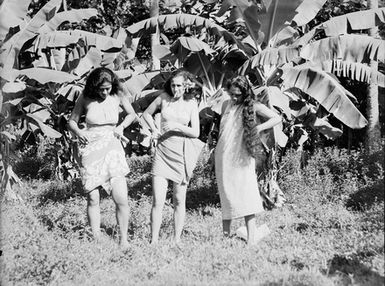 [Group portrait of three women]