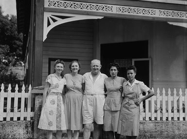 [Group portrait of Tudor Collins with four women]