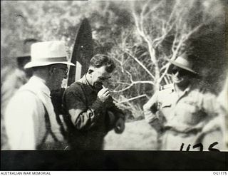 AITAPE, NORTH EAST NEW GUINEA. C. 1944-06. LEFT TO RIGHT: ARTHUR DRAKEFORD, THE MINISTER FOR AIR, JOHN DEDMAN, THE MINISTER FOR WAR ORGANISATION OF INDUSTRY, AND AIR COMMODORE F. R. W. SCHERGER, ..