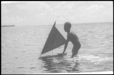 A boy learns to control a canoe, close-up view : Carteret Islands, Papua New Guinea, 1960 / Terence and Margaret Spencer