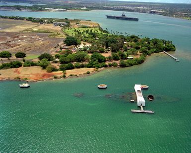 An aerial view of the USS ARIZONA Memorial, located off the northeast end of Ford Island