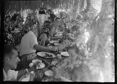 Welcoming reception in Tahiti showing guests dining