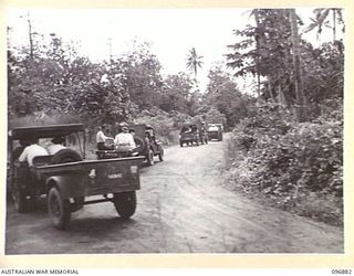 VUNAPOPE, NEW BRITAIN. 1945-09-16. JEEPS AND TRAILERS ARRIVE FROM RAMALE VALLEY CARRYING SISTERS, PRIESTS AND THEIR BELONGINGS ON THE FIRST STAGE OF THEIR EVACUATION TO RABAUL. CONTACT WITH THE ..