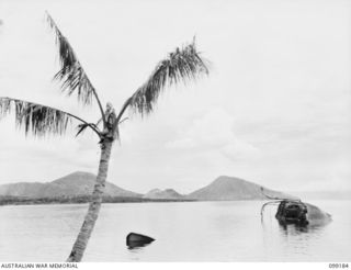 RABAUL, NEW BRITAIN, 1945-11-30. THE VIEW ACROSS KARAVIA BAY FROM THE CHINESE ARMY CAMP