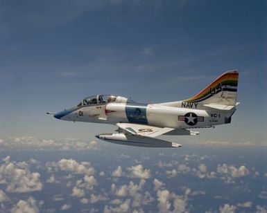 Air-to-air left view of a TA-4J Skyhawk aircraft from Fleet Composite Squadron 1 (VC-1) as it is piloted by CDR Davis, the squadron's executive officer