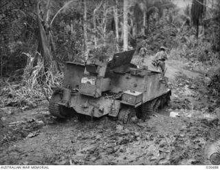 MILNE BAY, PAPUA. 1942-09. AN AUSTRALIAN BREN GUN CARRIER THAT RAN FOUL OF AN AUSTRALIAN MINE-FIELD ON 1942-08-28, KILLING THE REGIMENTAL MEDICAL OFFICER, CAPTAIN R. LYNE. THIS INCIDENT HAPPENED ..