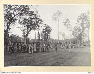 TOROKINA, BOUGAINVILLE, 1945-08-18. SPECIAL PARADE OF B CORPS SIGNALS WHICH WON BOTH THE LOCAL CRICKET AND AUSTRALIAN RULES FOOTBALL COMPETITIONS HELD IN 2 CORPS AREA. THE UNIT WAS INSPECTED BY ..