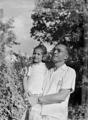 [Portrait of Pacific island man and daughter]