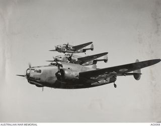 A flight of three Lockheed Hudson aircraft from No. 23 Squadron RAAF based at Amberley.  Nearest camera is A16-3 flown by 22 Flight Lieutenant (Flt Lt) Phillip Walter Howson, OBE. In the centre is ..