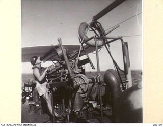 One of the gun crews manning the second Oerlikon anti aircraft gun positioned aft on HMA Fairmile Motor Launch ML 426. Commanded by Lieutenant (Lt) R C Pockley, ML 426 conducted operations along ..