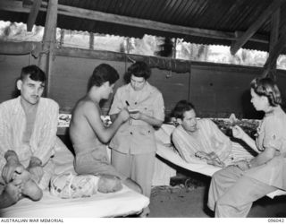 PALMALMAL, JACQUINOT BAY, NEW BRITAIN. 1945-09-08. AFTER THE JAPANESE SURRENDER, ALLIED PRISONERS WERE PICKED UP AT RABAUL BY HMAS VENDETTA AND BROUGHT TO JACQUINOT BAY. THEY WERE THEN TAKEN BY ..