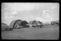 [Grumman F6F Hellcat aircraft at air base]